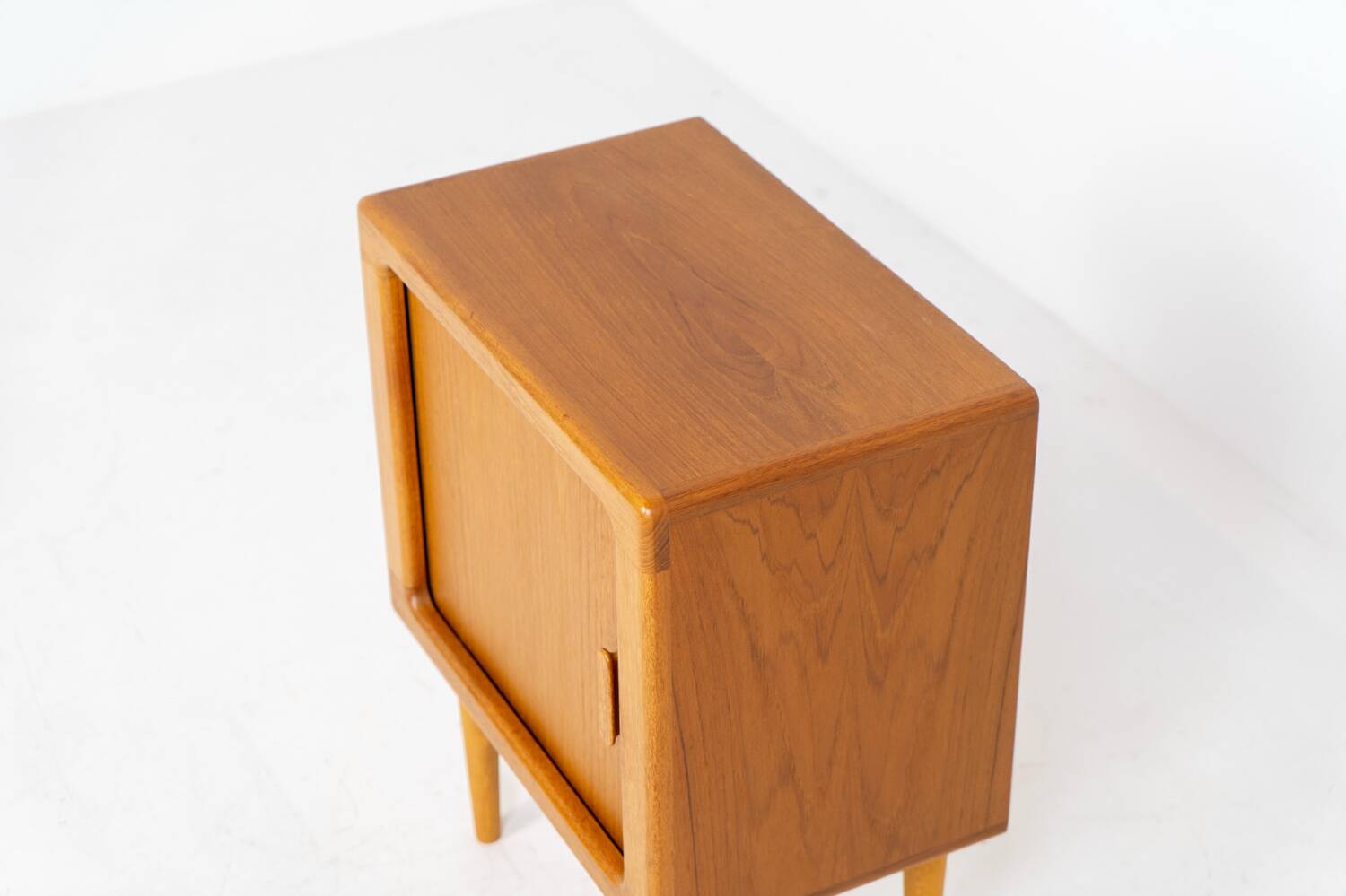 Compact cabinet with tambour door by CFC Silkeborg (Denmark, 1960s).