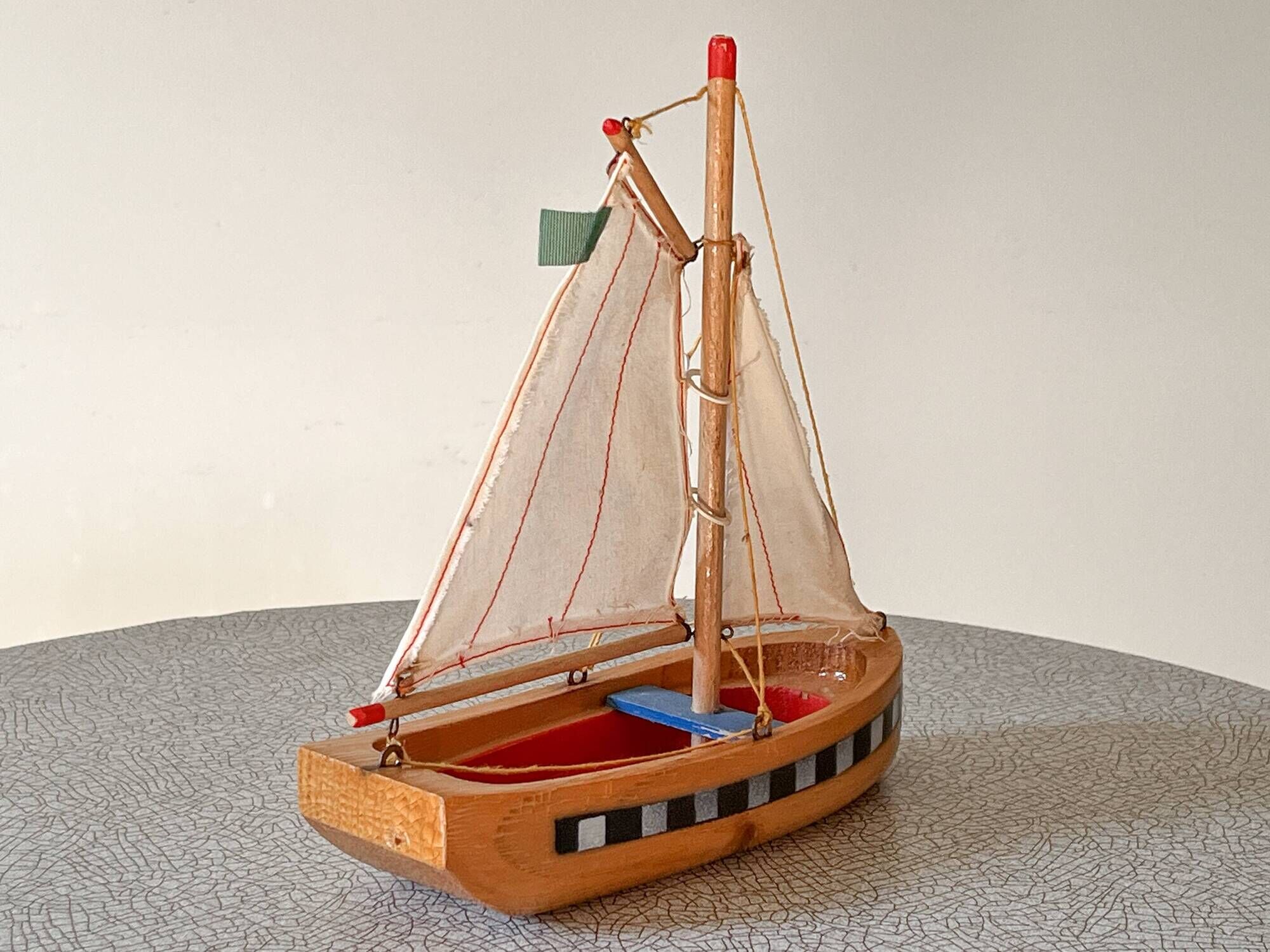 Wooden basin sailboat from the brand Lego, vintage toy.