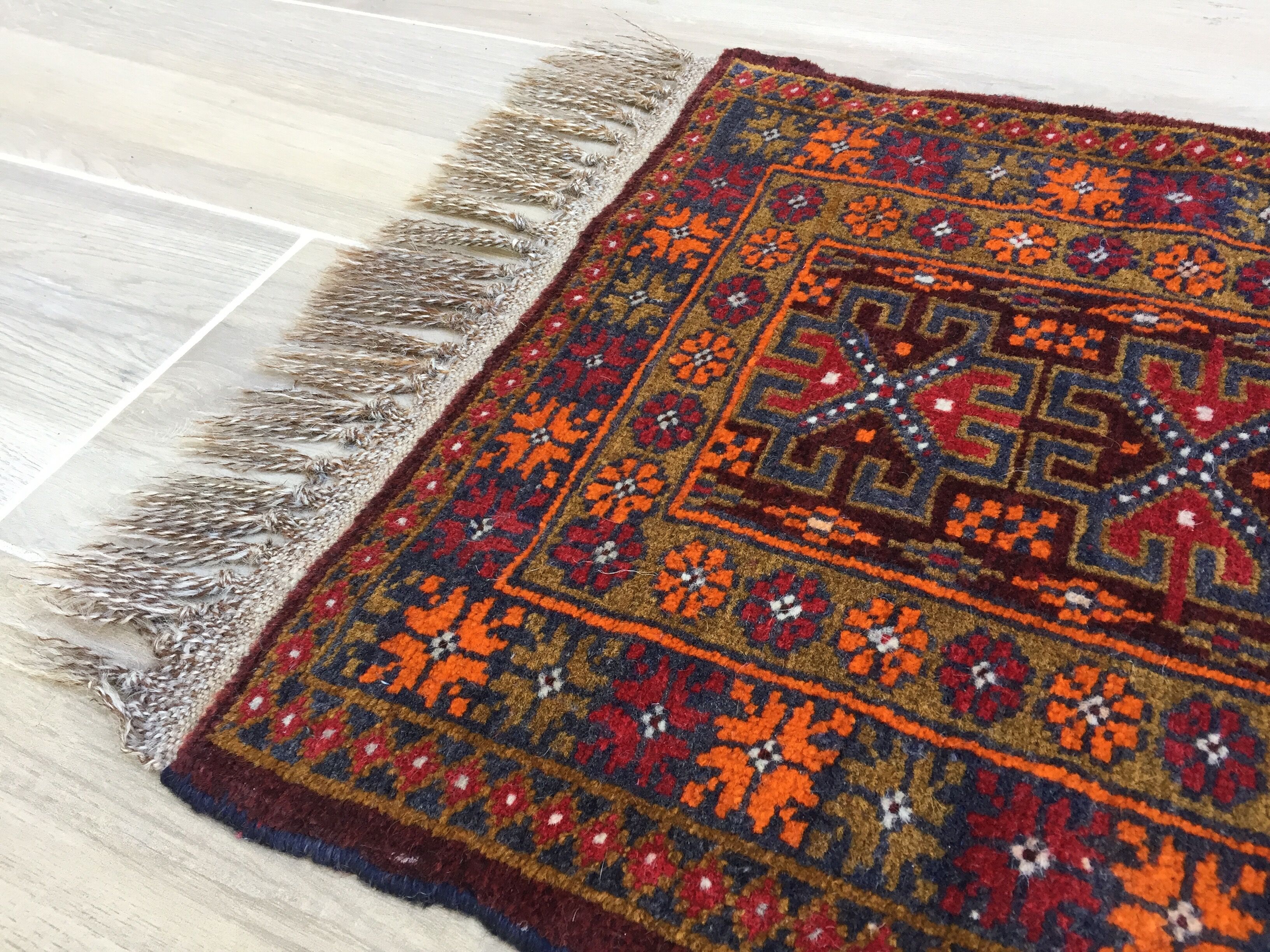 Small oriental wool rug - 80 x 46cm