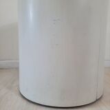 Armoire à barre vintage en forme de cylindre ouvrable, bois, laiton et verre.