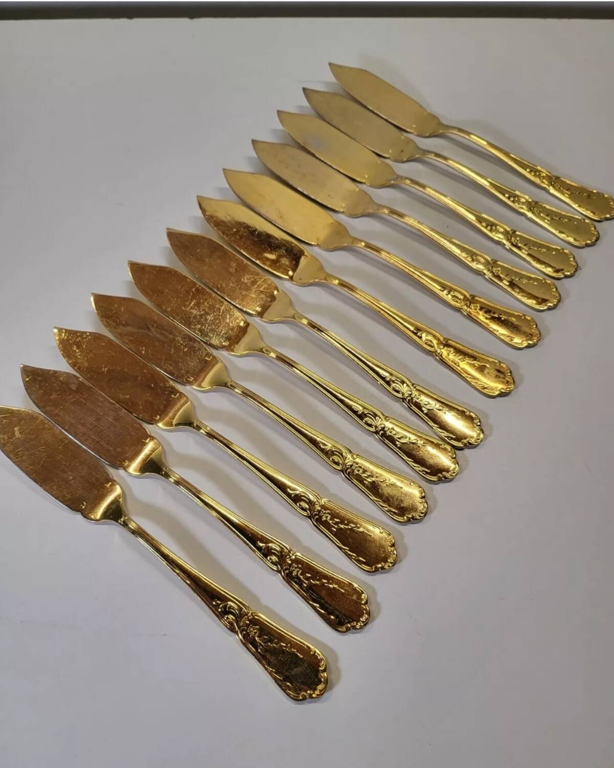 Gold metal fish cutlery, knives and forks 24 pieces
