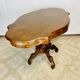 Violin-shaped pedestal table