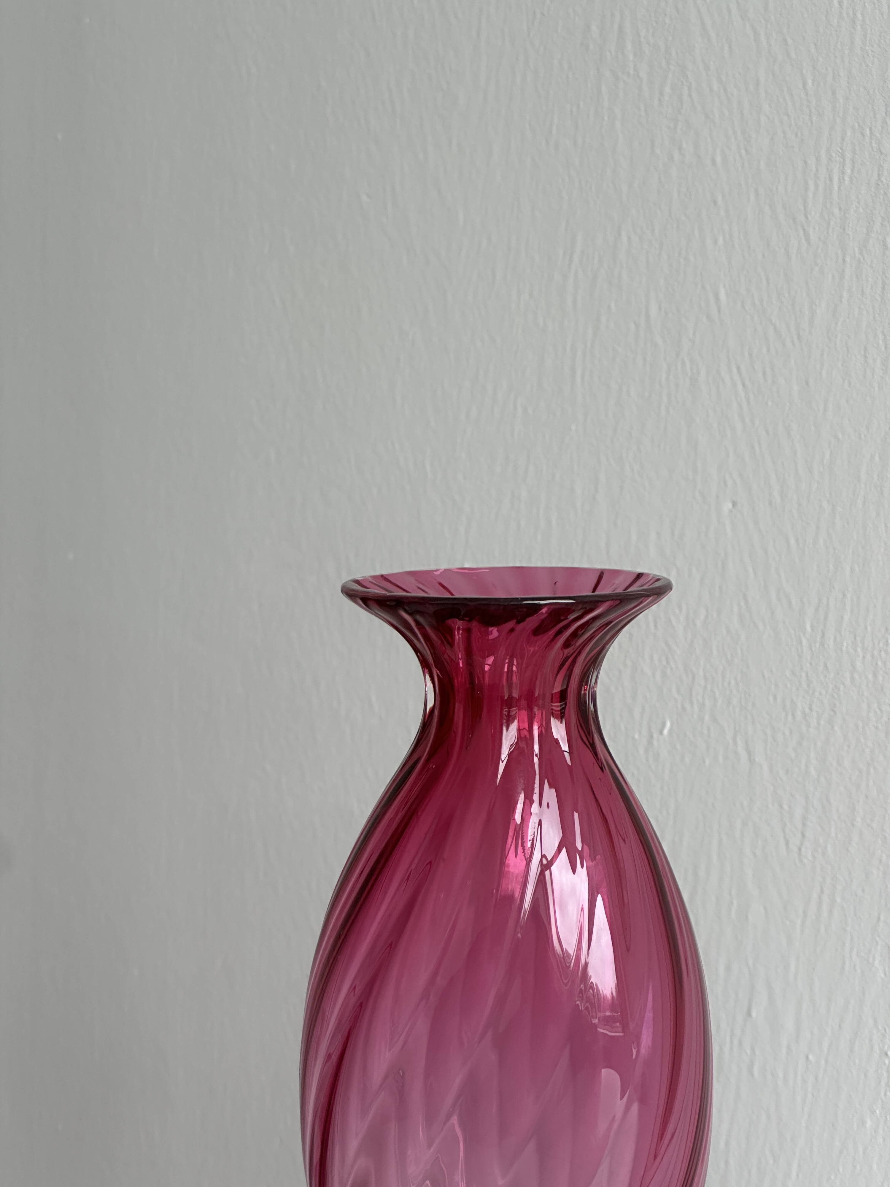 Twisted pink blown glass vase