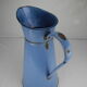 Old vintage enamelled sheet metal jug