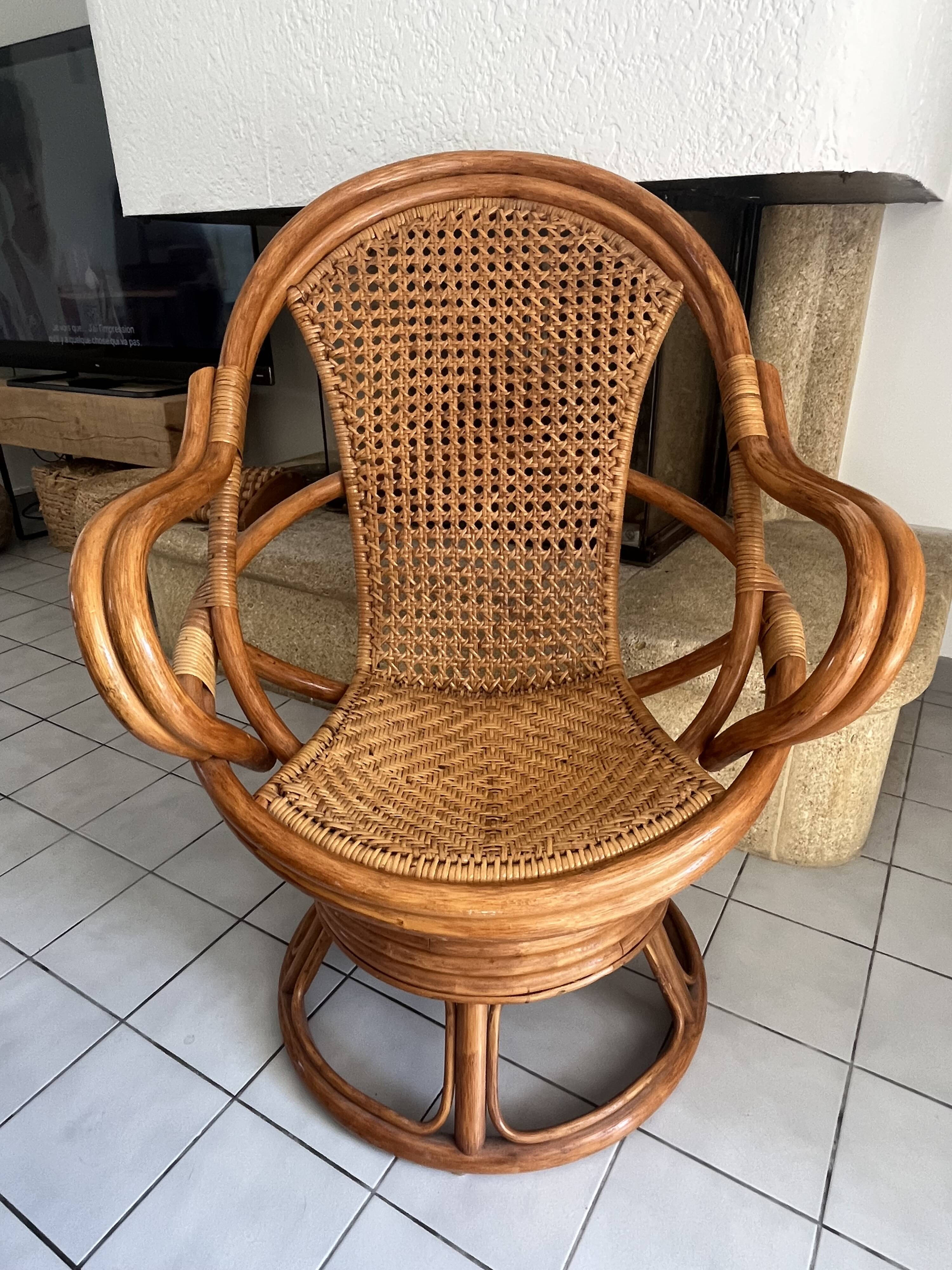 Vintage rattan and cane swivel armchair (1970s/80s) -