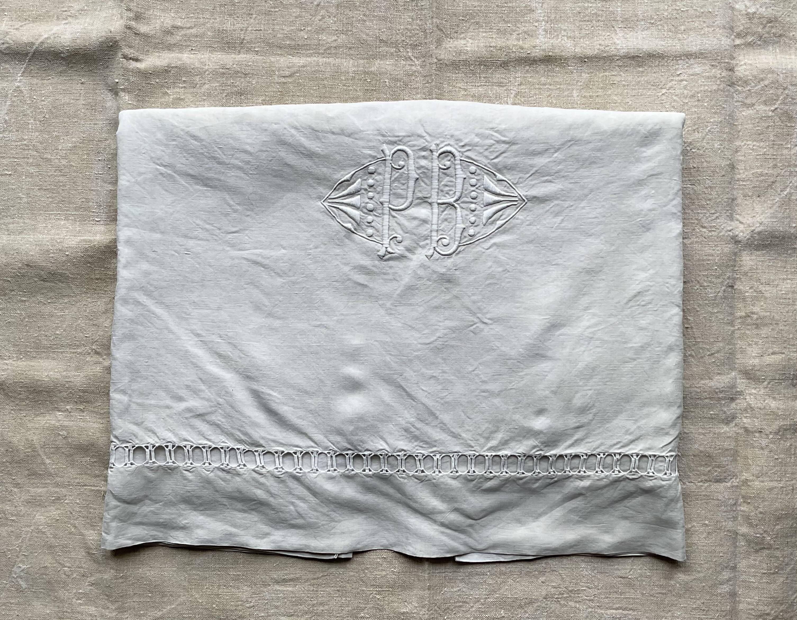Old hand-embroidered linen sheet