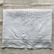 Old hand-embroidered linen sheet