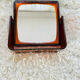 Vintage swivel mirror 70 ́s amber plastic