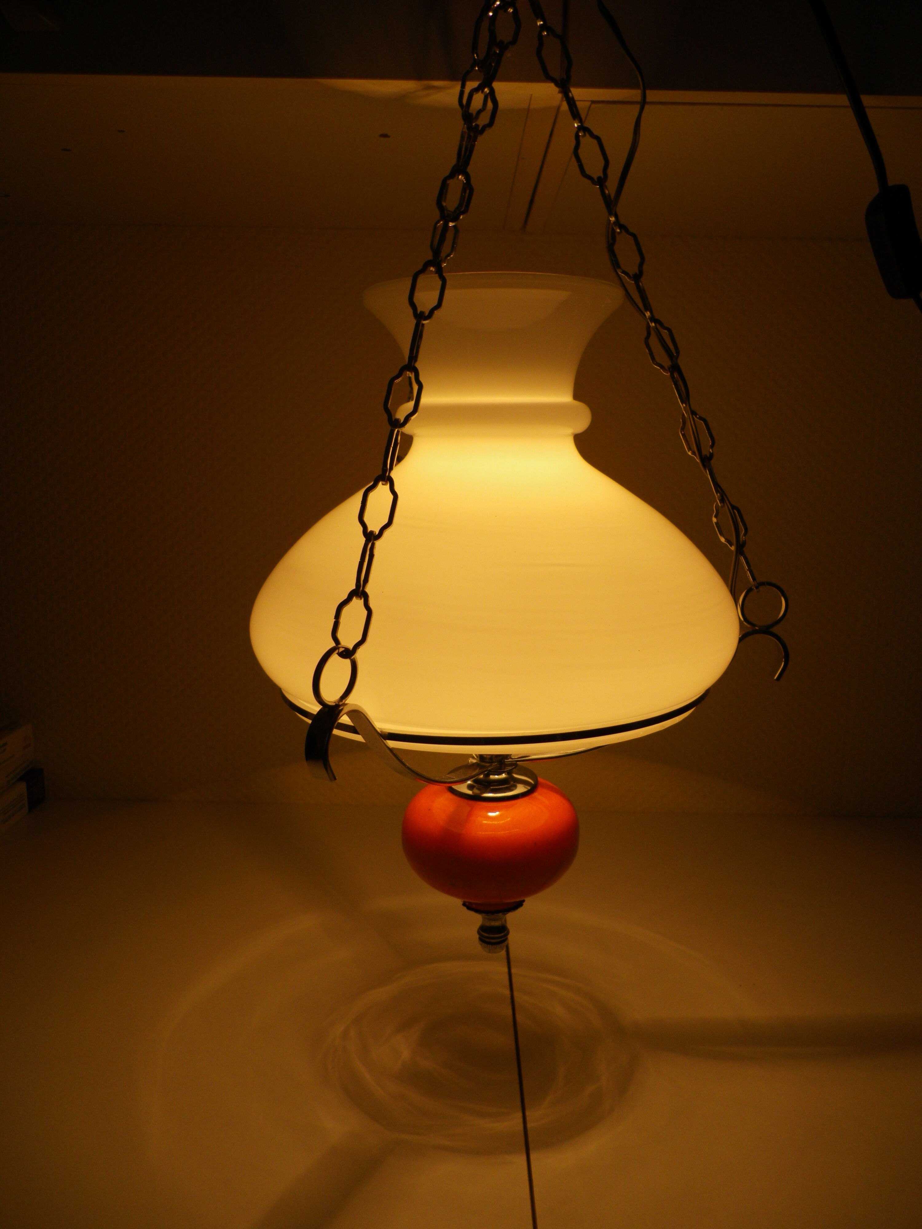 Vintage hanging from the 70s with chrome frame and enamelled orange ball finish