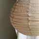 Large round pink Japanese-style suspension made of rattan and natural linen D60.