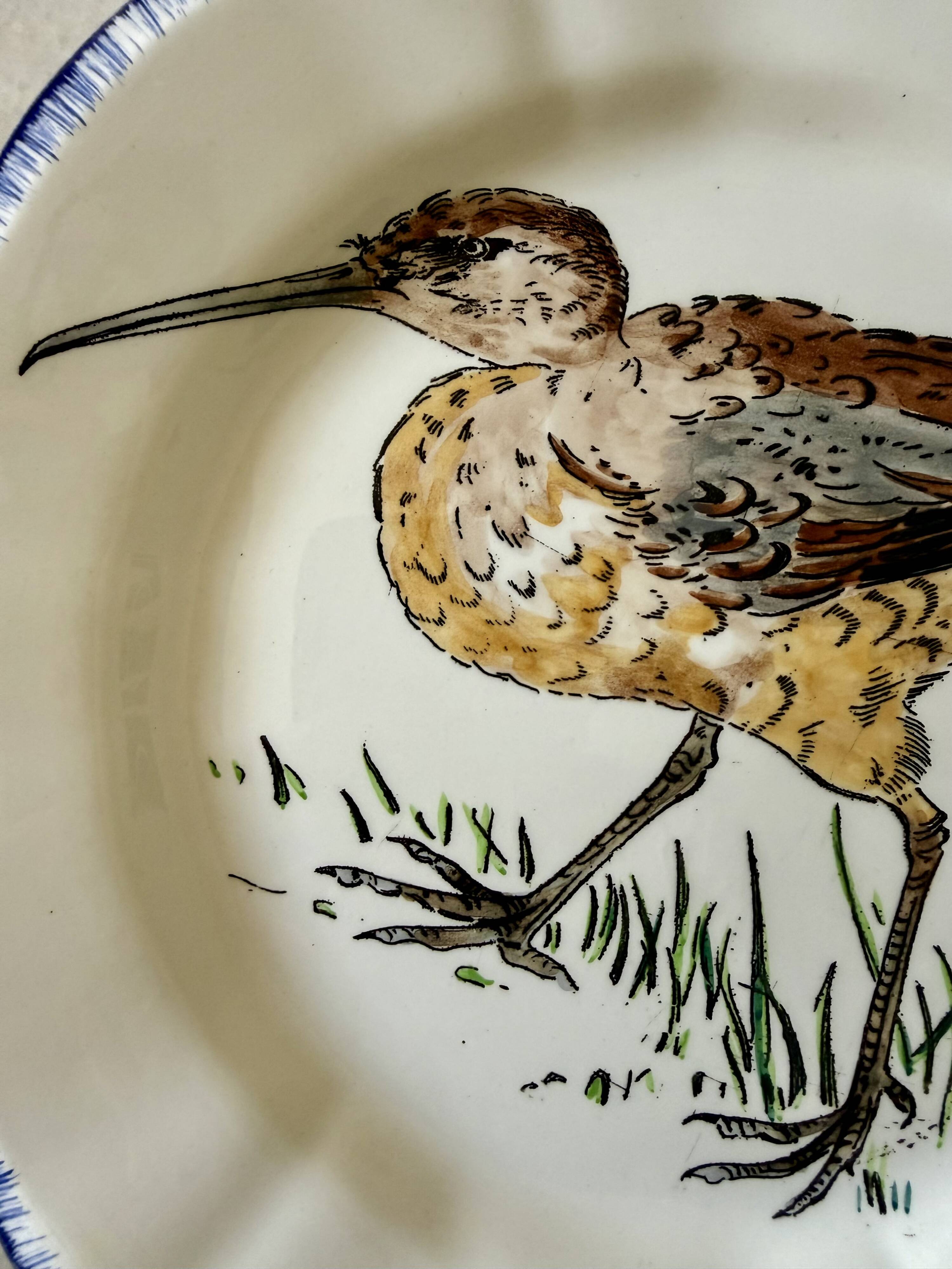 Service de table assiettes et plats Gien modèle grands oiseaux