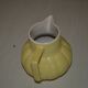 Lemon-shaped ceramic pitcher