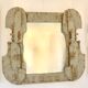 A wooden and plaster mirror, Italy 1960s.