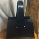 Black plexiglass magazine rack