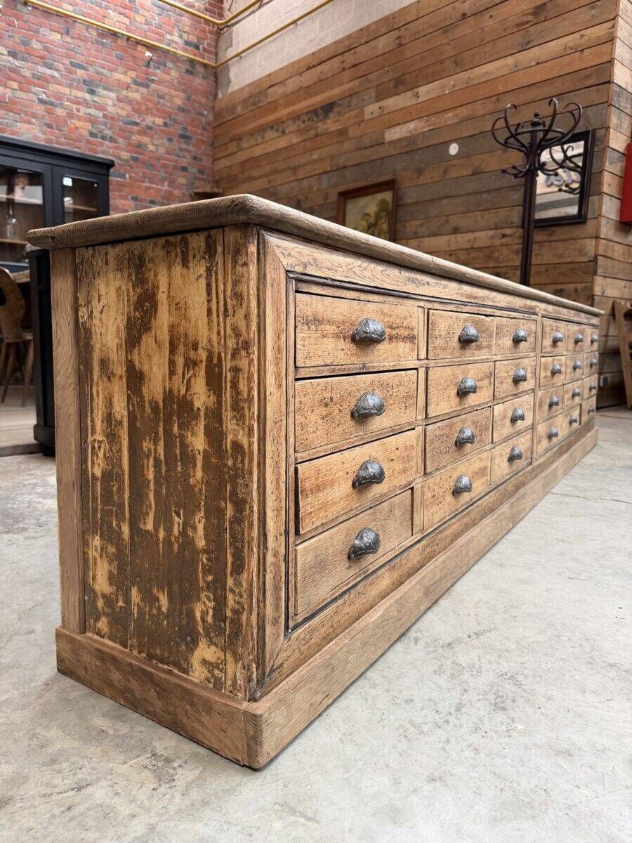 Large workshop furniture transformed into a TV unit.