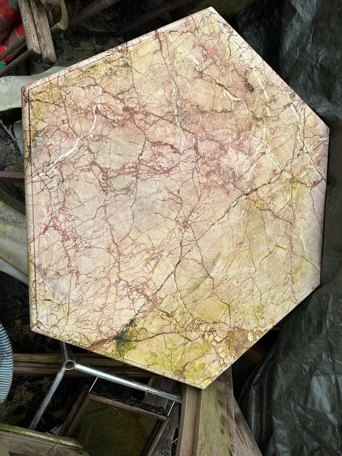 Wrought iron and marble garden table