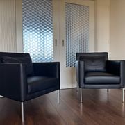 2 fauteuils de salon modernistes allemands en cuir noir et acier de Walter Knoll