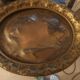 Decorative copper repoussé plate with marine motifs