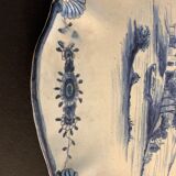Old dish mounted in ceramic, scallop