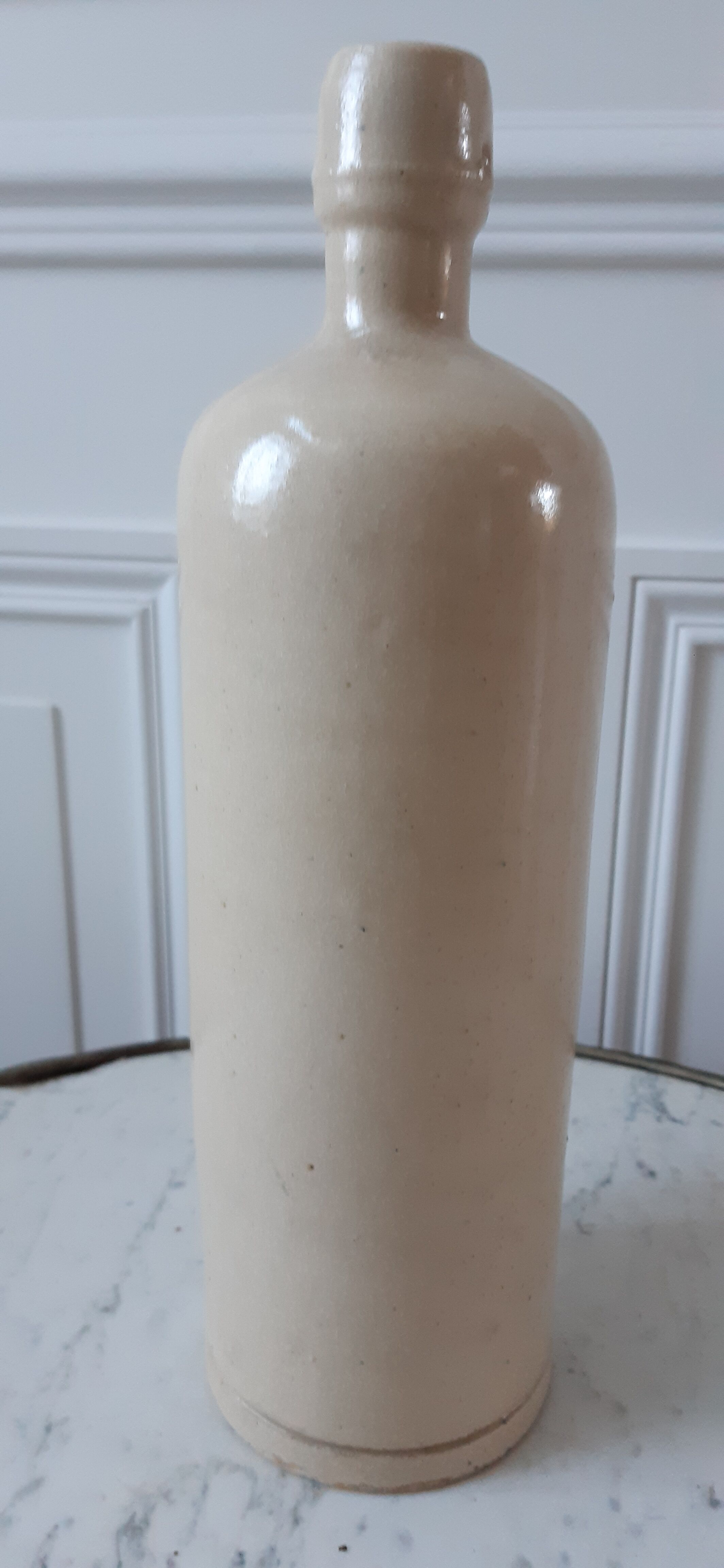 Bottle in ancient artisanal sandstone