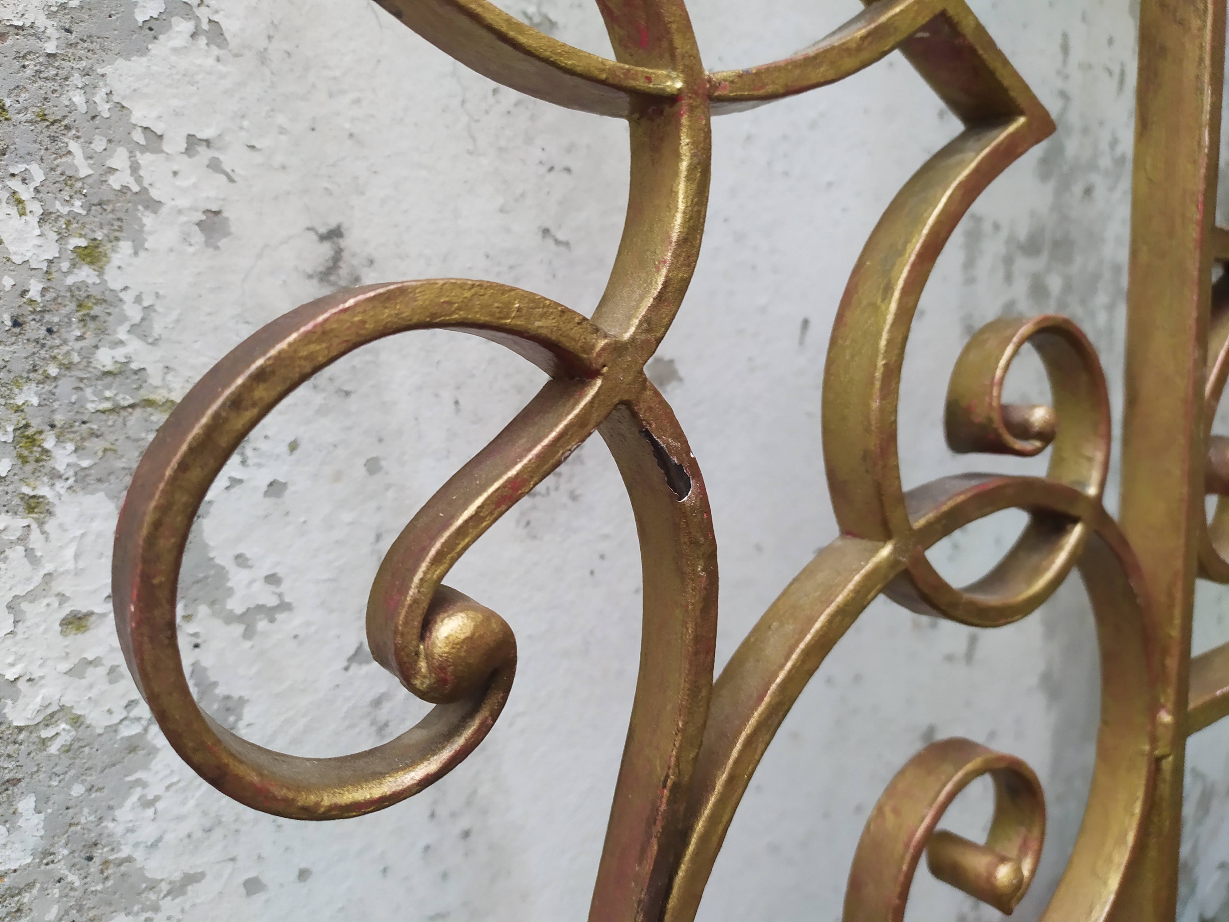 Golden wrought iron bedhead