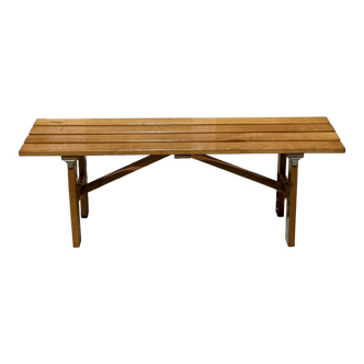 Folding bench in vintage varnished wood