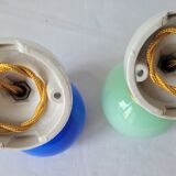 Duo of porcelain and opaline wall lamps