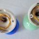 Duo of porcelain and opaline wall lamps