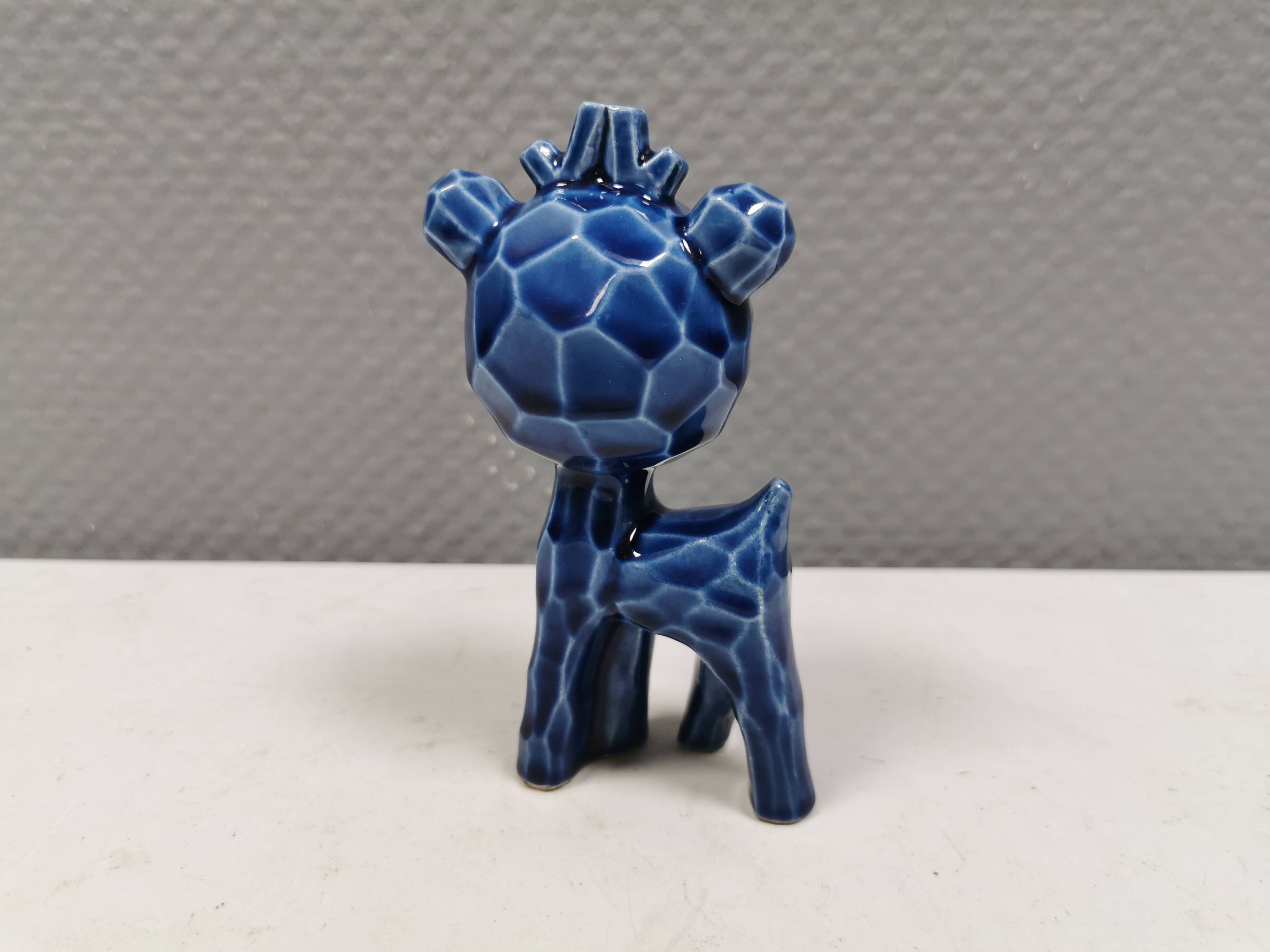 A Japanese ceramic “toy” from the 70s, blue Kawaii animal deer figurine.