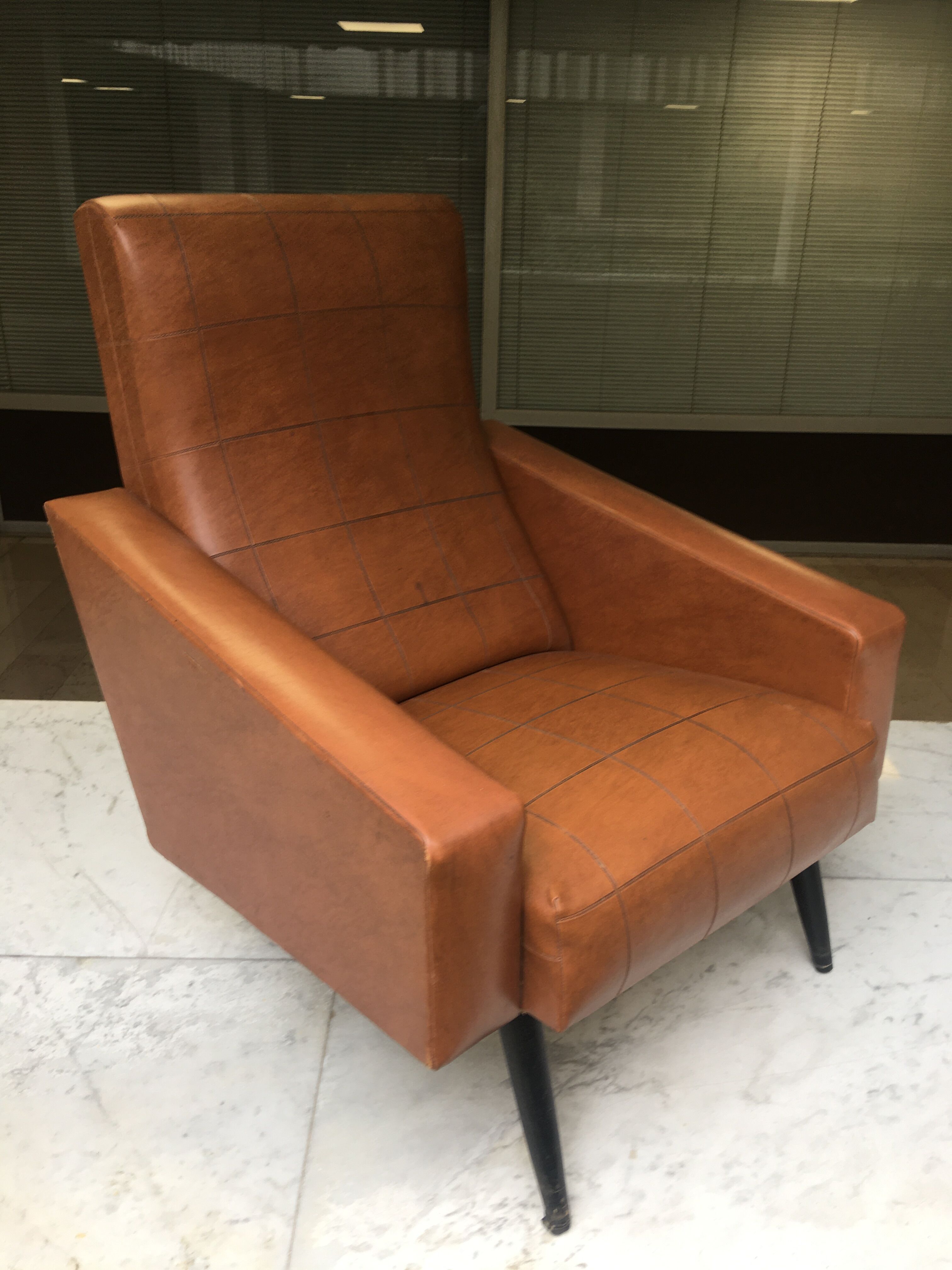 Brown skai armchair