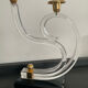 Pair of Hollywood Regency candlesticks in lucite and brass