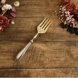 Engraved meat fork in silver and gold metal