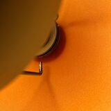 Vintage industrial lamp with a metal frame.