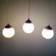 Art Deco trio of suspensions in white opaline, 1930s