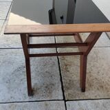 Vintage coffee table from the 1950s reconstruction, wood and glass.