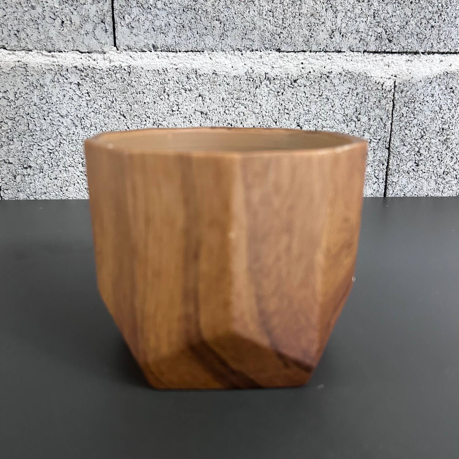 Ceramic flowerpot with wood decor
