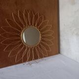 Sun mirror in gilded metal