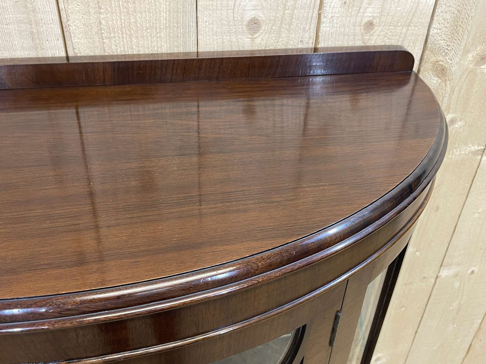 English mahogany showcase from the 1930s