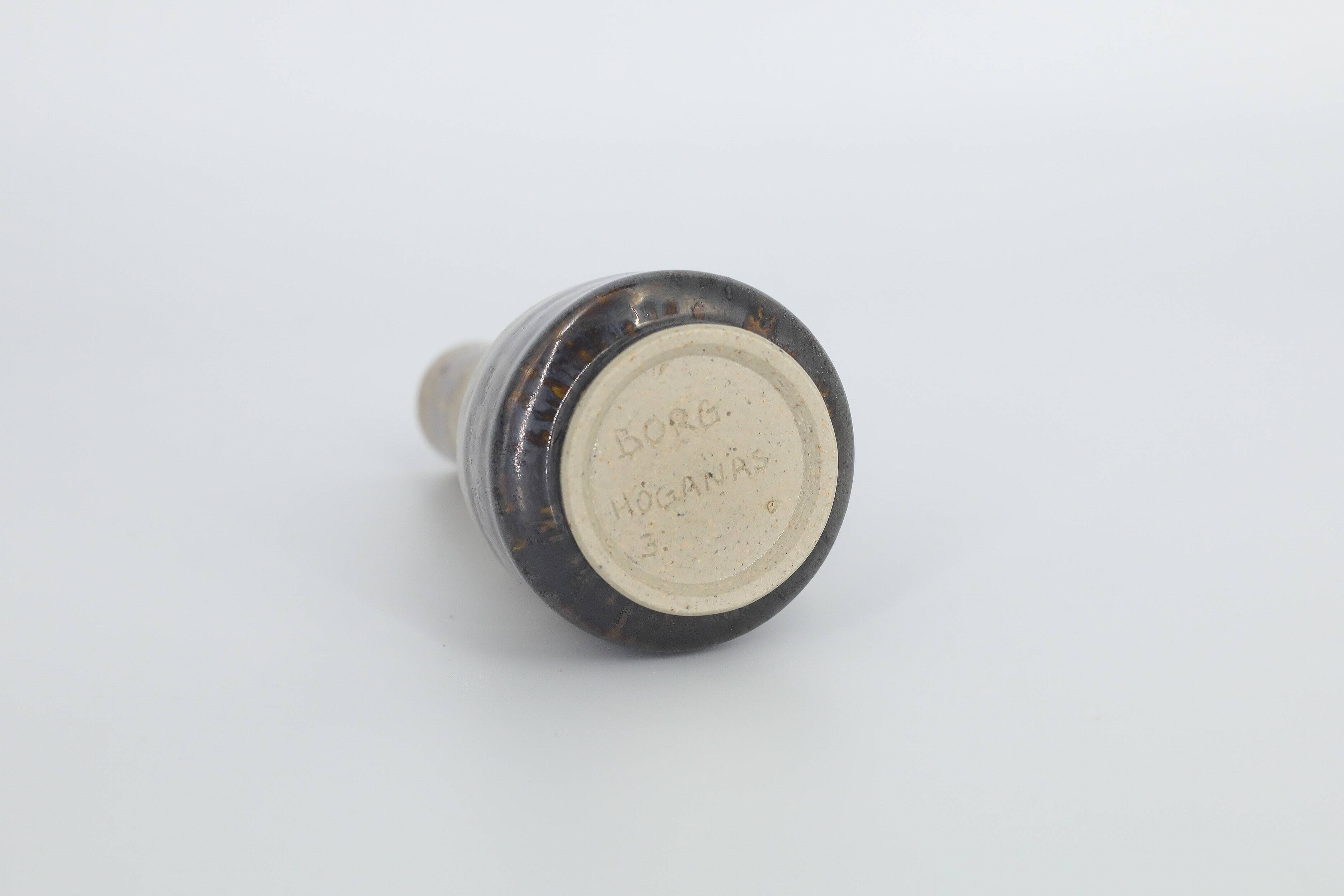 Small modern Scandinavian mid-century collection vase in glazed brown stoneware no. 3 by Gunnar Borg.