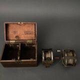 Two reel spools in their original 1900 box