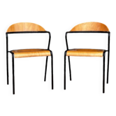 Pair of wooden and black metal chairs