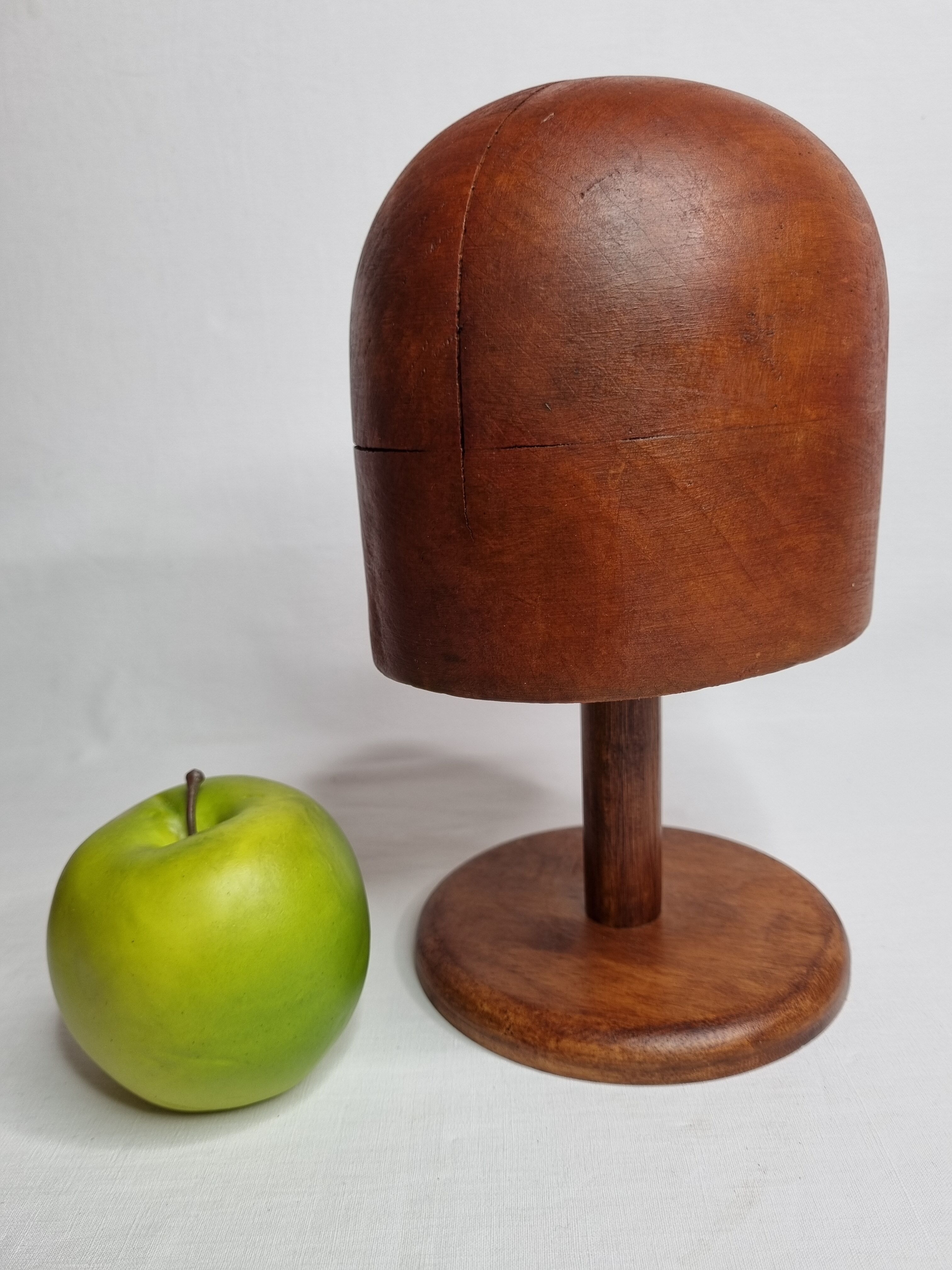 Old wooden hat shape on foot, 1900