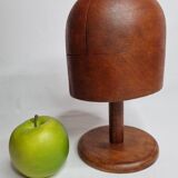 Old wooden hat shape on foot, 1900