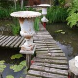 Pair of cast iron vases