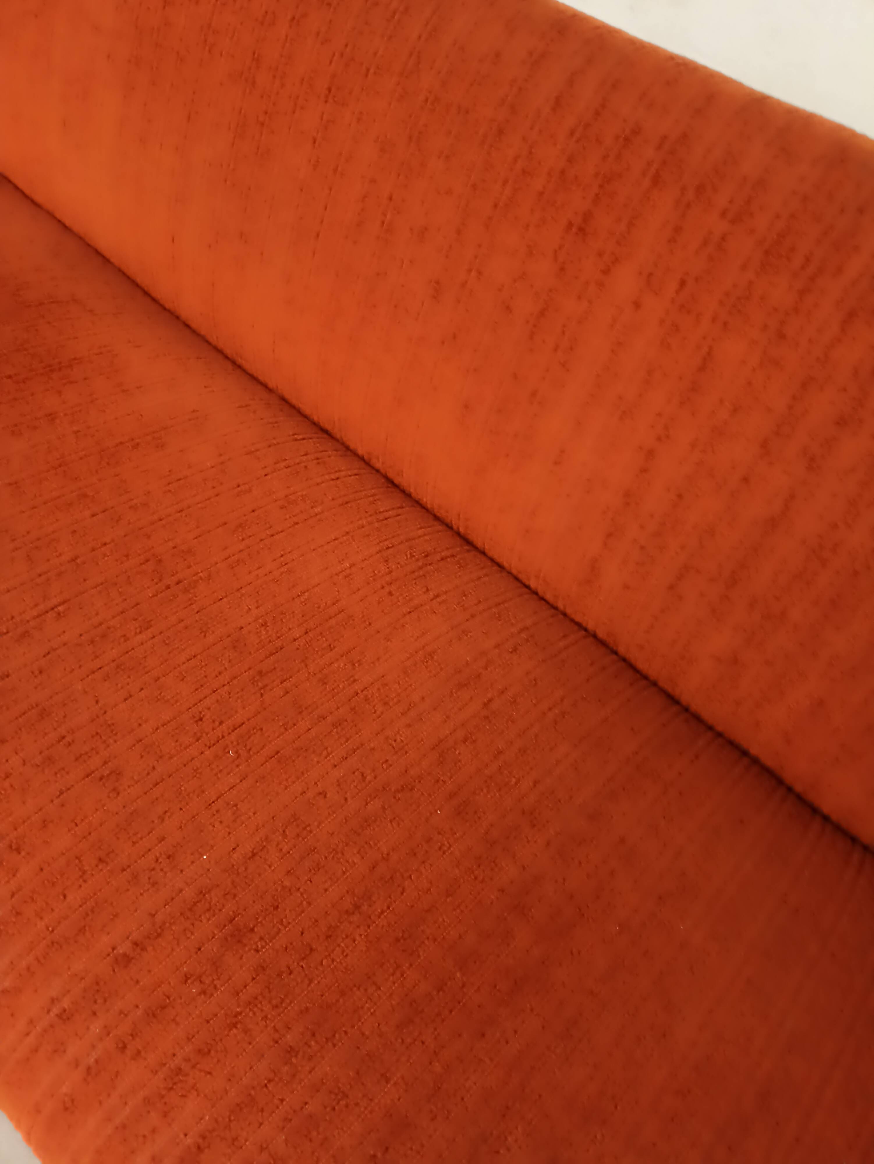 Vintage orange convertible sofa