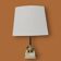 Hollywood Regency table lamp in gold brass and onyx - 1970s