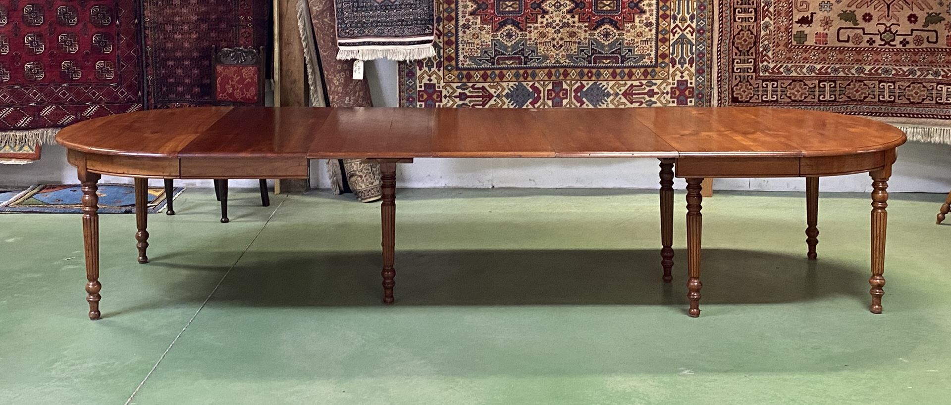 Louis Philippe round table 8 feet in cherry with 6 extensions
