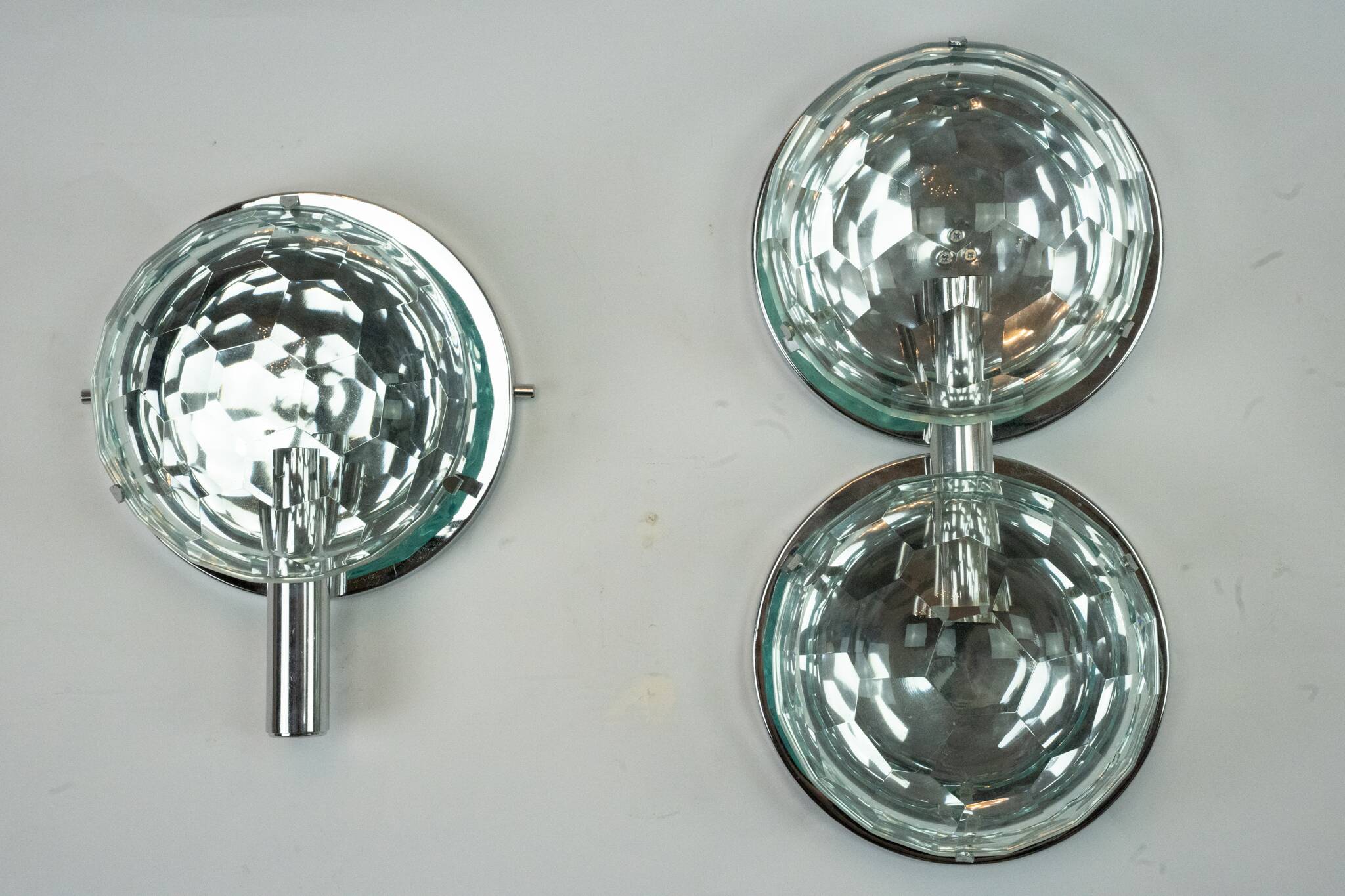 Set of three Cristal Art sconces in chrome and cut glass. Italy 1970s