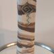 Turned stoneware vase signed with relief decoration.