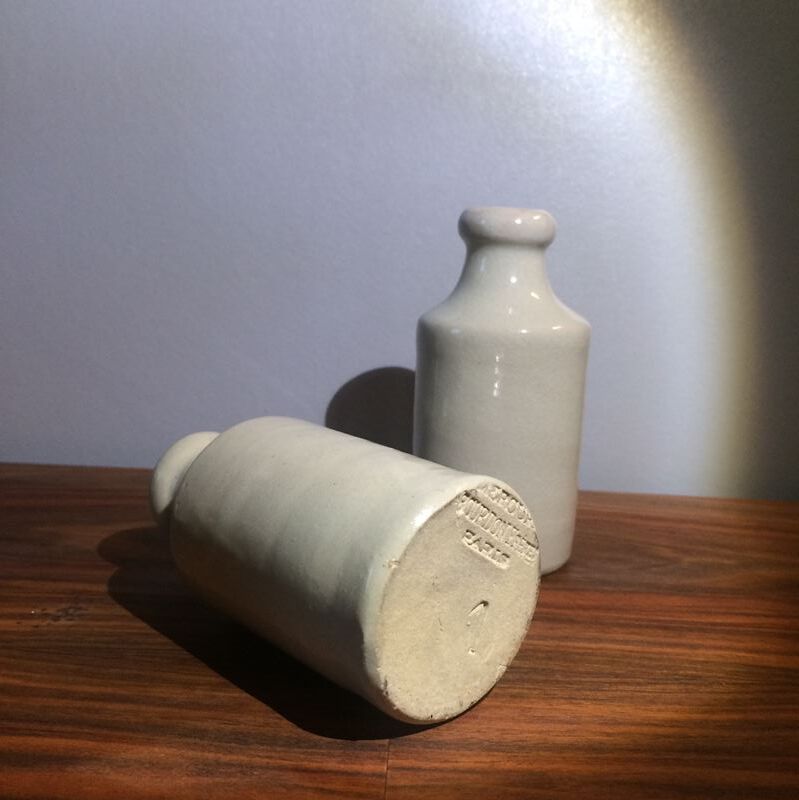 Set of 3 former mercury Bumblebee brothers stoneware bottles